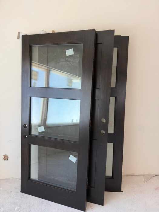 Custom-painted three-panel glass doors in matte black